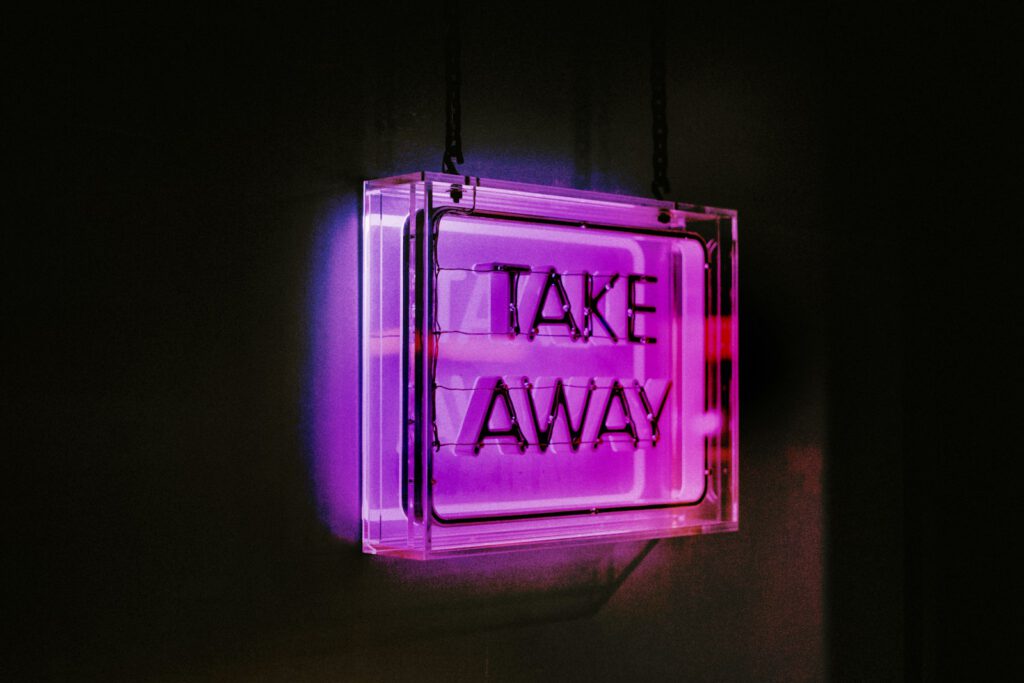 a purple light in a dark room